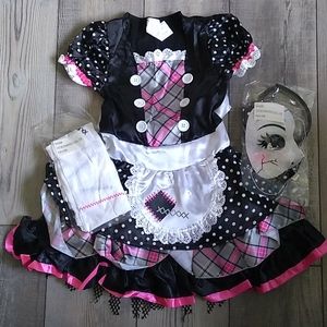 Damaged doll costume